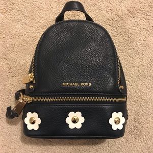 Michael Kors backpack style mini purse